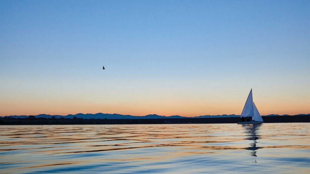 sailboat on smooth waters